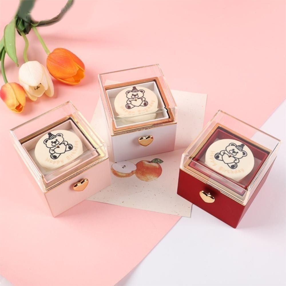 自動回転式ベアーフリップリングボックス、回転デザイン、ライト - Candle Surprise のレビューと価格